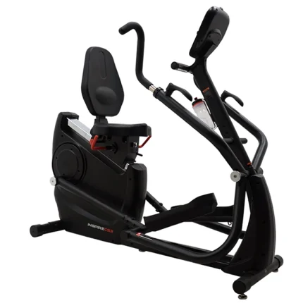 A person exercising on the Elliptical CS3.1 Inspire Fitness, showing its full-body motion and ergonomic design