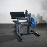 A person performing a bicep curl exercise on the Upper Body Bicep Tricep Curl Machine, highlighting the isolated muscle work