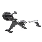 A person performing a full-body rowing workout on the Rower VR500 Pro Bodycraft