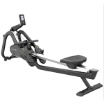 A person performing a full-body workout on the Rower Machine Matrix, highlighting its ergonomic design