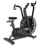 A person performing a high-intensity workout on the Bike HD Air Hammer Strength, showing both arm and leg movement