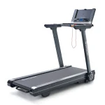 A person running on the Treadmill Stride-6 Echelon, showcasing its open-front design and tablet holder