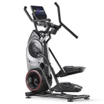 A person working out on the Elliptical Max Trainer M9 BowFlex, showing its unique climbing motion and touchscreen