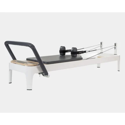 Allegro 2 Pilates Reformer with white aluminum frame and Infinity Footbar