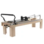 Clinical Pilates Reformer with Infinity Footbar in a physical therapy setting
