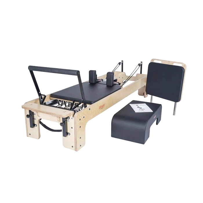 Fitkon Pilates Powerhouse Reformer with premium wood frame and black upholstered carriage Fitkon Pilates Powerhouse Reformer with premium wood frame and black upholstered carriage