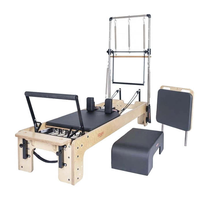 Fitkon Powerhouse Plus Reformer with Tower featuring premium wood base and stainless steel vertical frame Fitkon Powerhouse Plus Reformer with Tower featuring premium wood base and stainless steel vertical frame