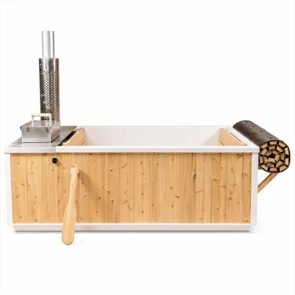 Front view of the LeisureCraft Starlight Wood Burning Cedar hot tub with roll-up cover in a natural setting