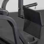 Lower Body Plate Loaded Kickback Glute A person demonstrating a glute kickback exercise, highlighting the range of motion and body position