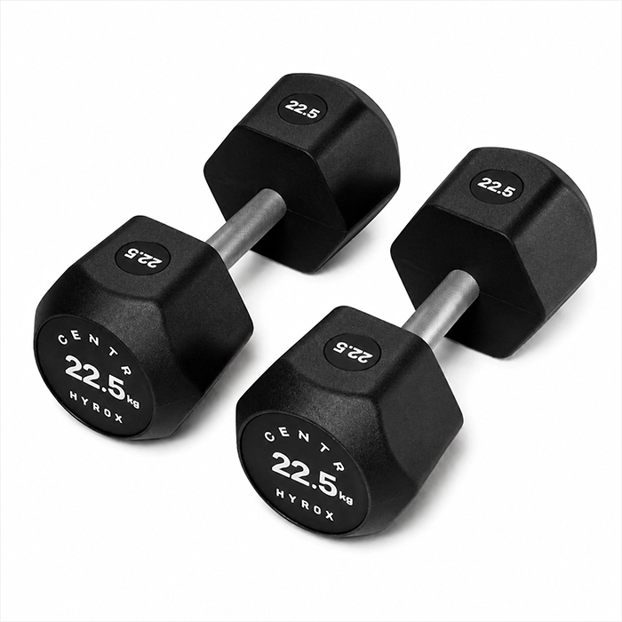 Pair of Centr x HYROX Commercial Urethane Dumbbell on a gym floor Pair of Centr x HYROX Commercial Urethane Dumbbell on a gym floor