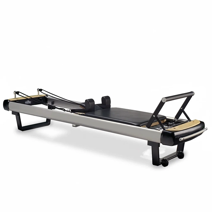 Peak Pilates MVe Reformer Bundle with stackable aluminum frame and black upholstery Peak Pilates MVe Reformer Bundle with stackable aluminum frame and black upholstery