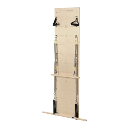 Pilates Springboard Wall Unit mounted on a studio wall with resistance springs