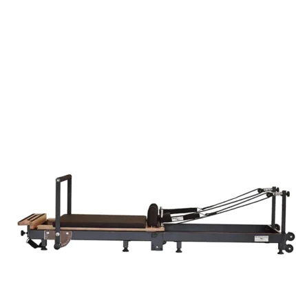 Private Pilates Foldable Metal Reformer Machine unfolded in a home studio