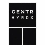 Professional athletes training on the HYROX Official Competition Perform Turf with sleds