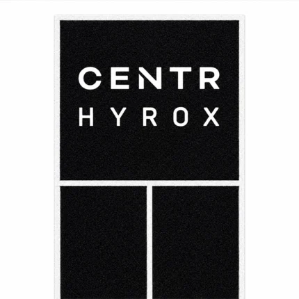 Professional athletes training on the HYROX Official Competition Perform Turf with sleds