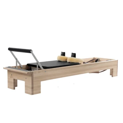 Ron Fletcher Pilates Reformer with solid wood frame and traditional leather straps