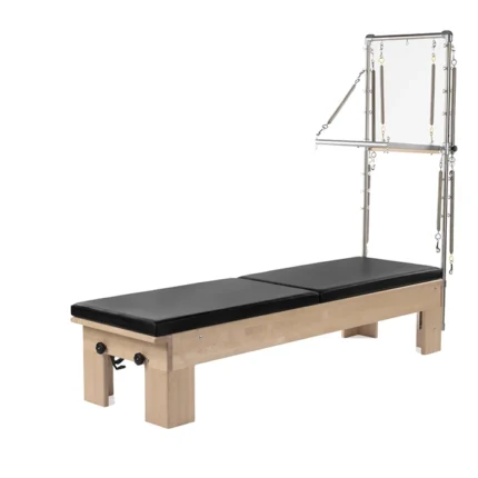 Studio Reformer with Tower and Mat in a professional Pilates studio