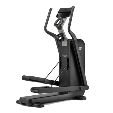 Technogym Compact Elliptical in a modern living room showing its space-saving footprint