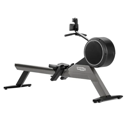 Technogym Rower Skillrow Grey indoor rowing machine in a professional training environment