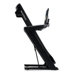 The NordicTrack Commercial 2450 Treadmill in its folded, SpaceSaver design, demonstrating its compact storage