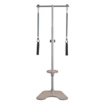 User practicing postural alignment on the BASI Systems Ped a Pull Without Stool
