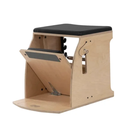 Wunda Chair Pilates Machine with black springs and padded non-slip pedal